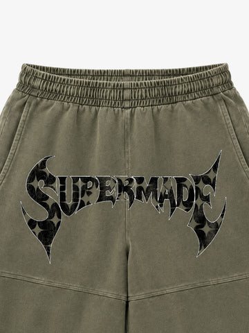 Camo Paneled Distressed Cropped Sweatpants