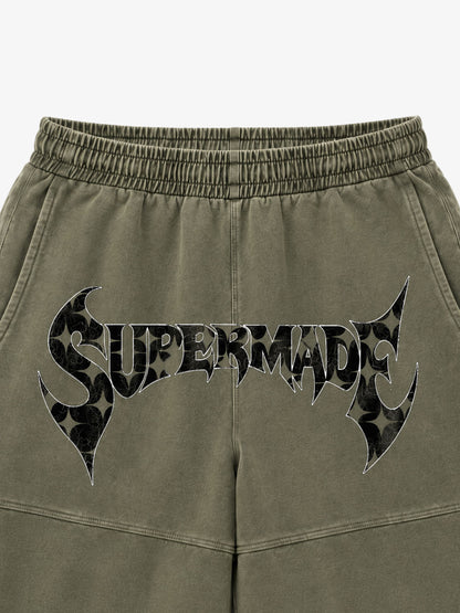 Camo Paneled Distressed Cropped Sweatpants