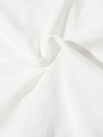 Close-up of white fabric with folds
